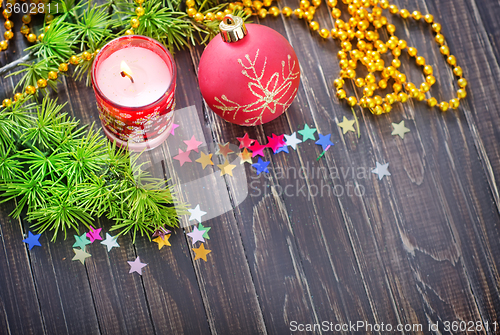 Image of candle and christmas decoration