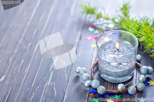 Image of candle and christmas decoration