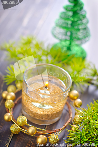 Image of candle and christmas decoration