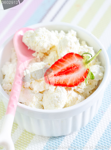 Image of cottage with strawberry