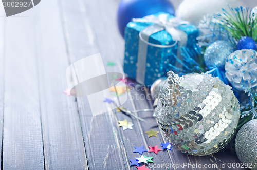 Image of christmas decoration on wooden background