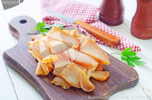 Image of smoked fish on board