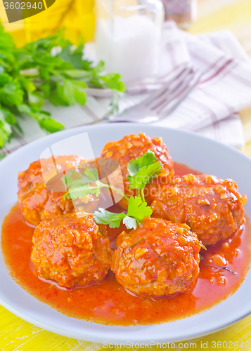 Image of meat ball with tomato sauce