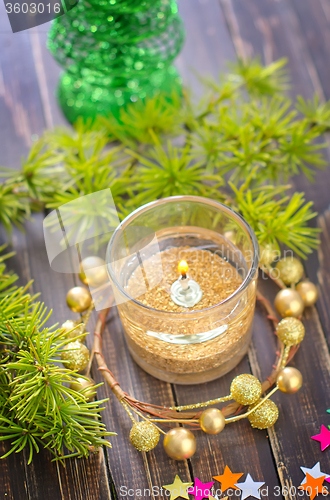 Image of candle and christmas decoration