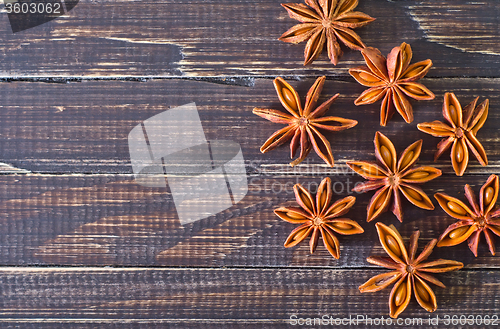 Image of anise on wooden board