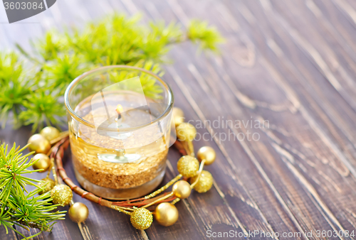 Image of candle and christmas decoration