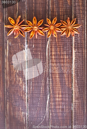 Image of anise on wooden board