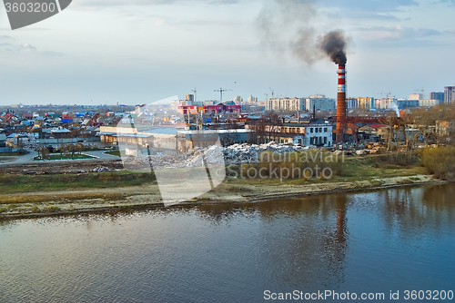 Image of Plywood combine on river bank. Tyumen. Russia