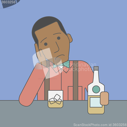 Image of Man with bottle and glass. 