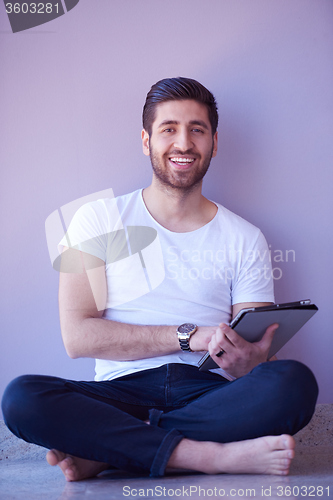 Image of student working on tablet