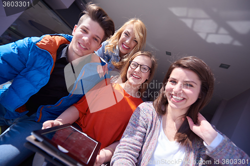 Image of students group working on school  project  together