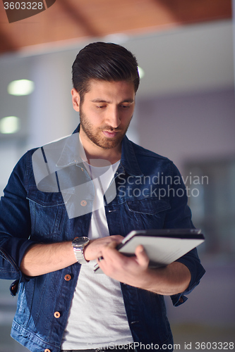 Image of student using tablet computer