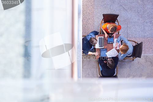 Image of students group working on school  project  together