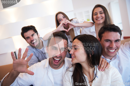 Image of group of friends taking selfie