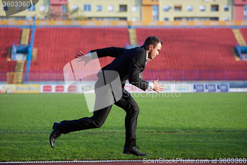 Image of business man ready to sprint