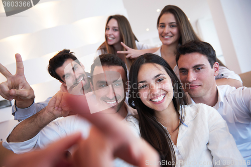 Image of group of friends taking selfie