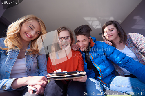 Image of students group working on school  project  together