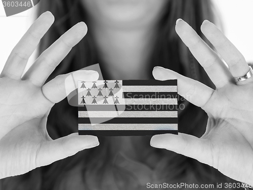 Image of Woman showing a blank business card