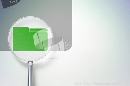 Image of Business concept:  Folder with optical glass on digital background