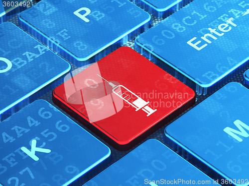 Image of Health concept: Syringe on computer keyboard background