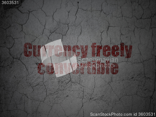 Image of Currency concept: Currency freely Convertible on grunge wall background