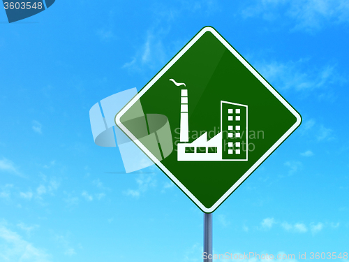 Image of Finance concept: Industry Building on road sign background