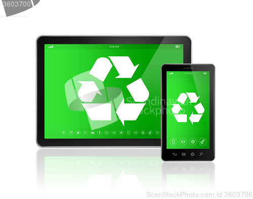 Image of Digital tablet PC with a recycling symbol on screen. environment