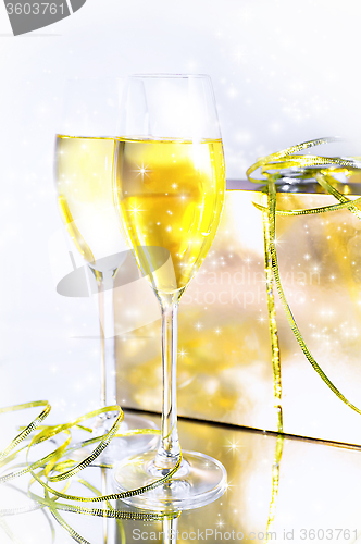 Image of Two glasses of wine and a box on white background