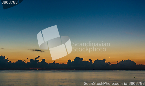 Image of Cloudy dawn at sea