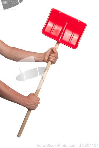 Image of Small red snow shovel 