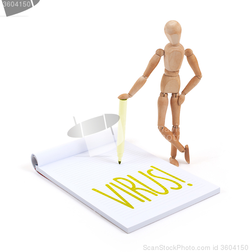 Image of Wooden mannequin writing - Virus