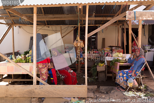 Image of Indonesian muslem woman in street market, Manado