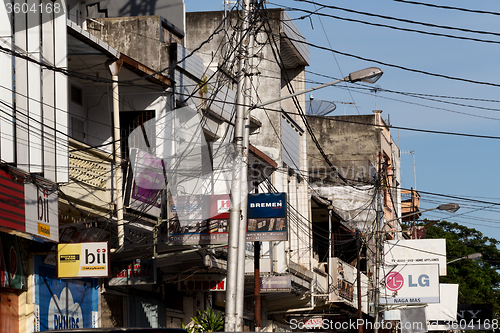 Image of Billboards and communications cables on Manado street