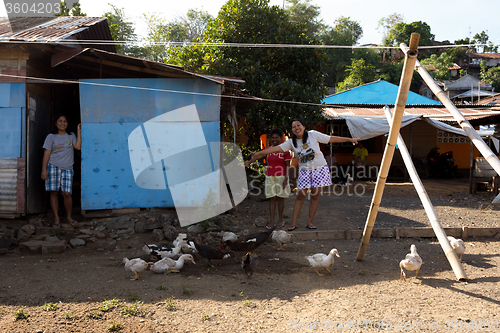 Image of Happy indonesian womans in Manado shantytown