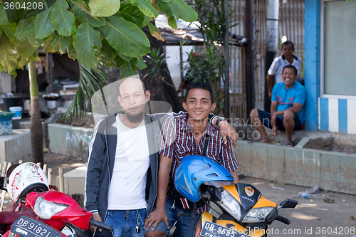 Image of young happy muslim teenagers