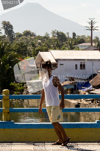 Image of Indonesian boy in Manado shantytown