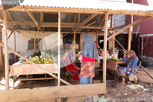 Image of Indonesian muslem woman in street market, Manado