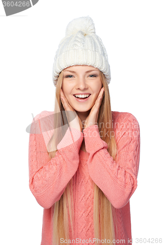 Image of Surprised winter woman