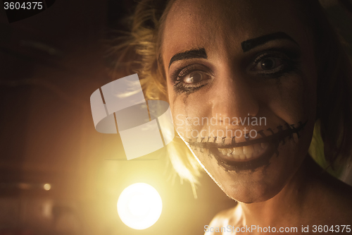 Image of Horrible girl with scary mouth and eyes