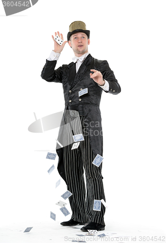 Image of Illusionist Shows Tricks with Playing Card