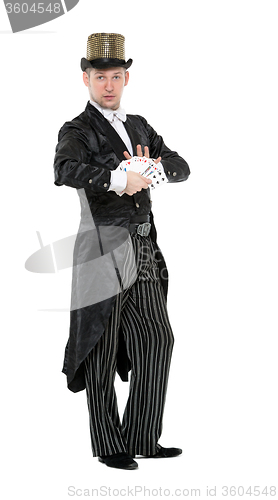 Image of Illusionist Shows Tricks with Playing Card