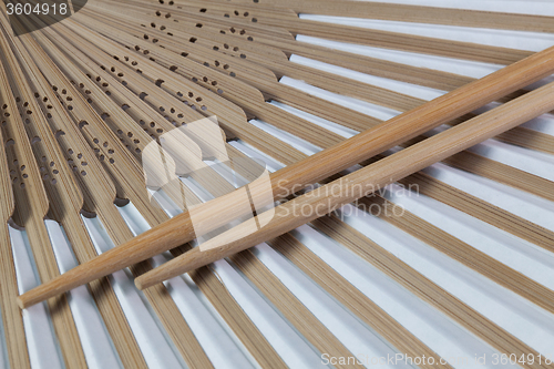 Image of Typical Japanese hand fan and chopsticks