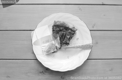 Image of Half-eaten slice of pecan pie