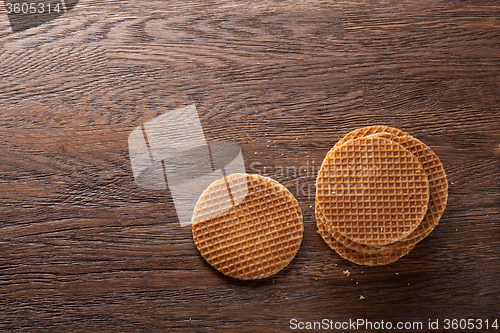 Image of Waffles with caramel on wood