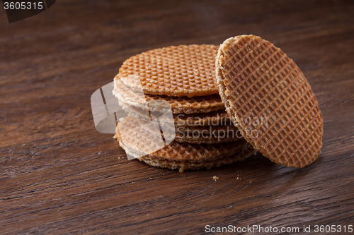 Image of Waffles with caramel on wood