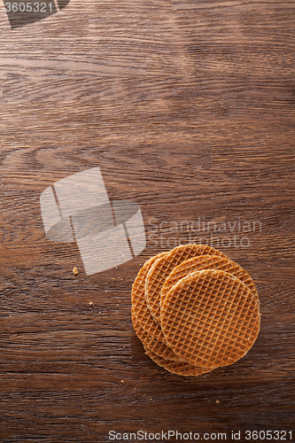 Image of Waffles with caramel on wood