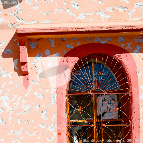 Image of   window in morocco africa old construction and brown wall  