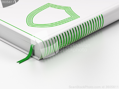 Image of Security concept: closed book, Contoured Shield on white background