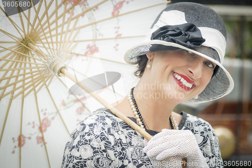 Image of 1920s Dressed Girl with Parasol Portrait