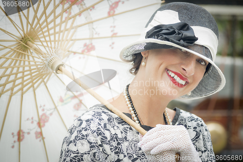 Image of 1920s Dressed Girl with Parasol Portrait